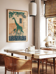 Green giraffe riding a bicycle in front of a rustic brick building, illustration art print, whimsical animal wall decor. - Image 3