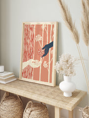 Illustrative Giving Hands Wall Art with one dark hand offering a red patterned sphere to a light hand, against a red botanical background. - Image 3