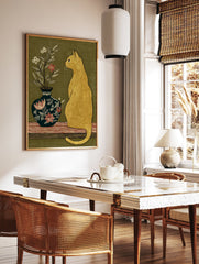 Golden cat wall art illustration looking at a dark floral vase with red and white flowers on a striped surface with a green background. - Image 2