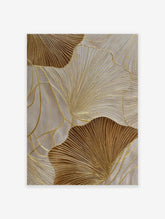 Golden ginkgo leaf abstract wall art with textured lines on a light neutral background, featuring metallic accents.