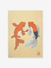 Japanese-style illustration of two orange and black goldfish on a light yellow textured background with a red seal.