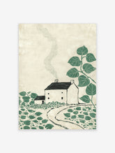 Green botanical cottage art print with white house, winding path, and leafy branches