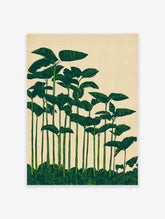 Green botanical wall art print featuring tall tropical leaves in an illustrative style against a light beige background.