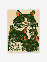 Green cat art print with three stylised cats, orange ears, green eyes, and beige textured background