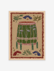 Cultural drum art print with green body, blue flowers, and red patterned border on a beige background.