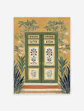 Vibrant green door wall art surrounded by tropical plants and white flowers on a yellow wall with red steps leading up.