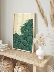 Green fan-shaped leaves or fungi with wave-like splashes in a Japanese woodcut art print style, in an alternate framed mockup