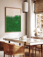 Illustrative green frog wall art print showing two cartoon frogs peeking from tall green grass on a light background. - Image 2