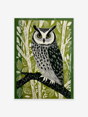 Illustrative lino print of a long-eared owl with green eyes, perched on a branch, set against a green forest background