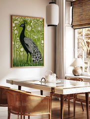 Black peacock with white patterned feathers against a vibrant green background with white botanical, in a styled room mockup
