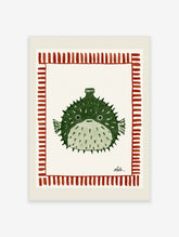Green pufferfish illustration with bottle-shaped top and red striped border on cream background