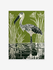 Green linocut print of a patterned stork wading in water with reeds and reflections