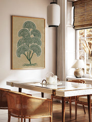 Green stylised tree botanical art print with fan-shaped leaves on a textured beige background, in a styled room mockup