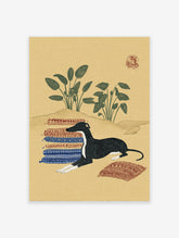 Illustrative art print featuring a black and white Greyhound dog lying on patterned rugs in a desert landscape with green plants.