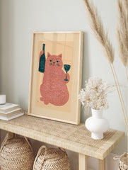 Grumpy red cat art print holding a dark blue wine bottle and a glass on a light peach background, illustrative style. - Image 3
