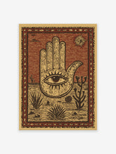 Hamsa Hand poster with an eye in the palm, set in a desert scene with cacti, agave plants, and a sun in a cultural art style.
