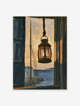 Hanging lantern with lit flame seen through a window frame, with sailboat mast and blue sea beyond