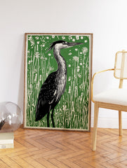 Linocut art print of a heron bird standing in tall green grass and white wildflowers. - Image 2