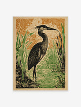 Illustrative print of a black heron bird in green wetland reeds and water, with an orange patterned background