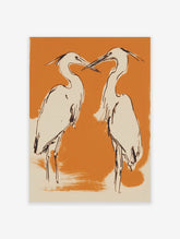 Illustrative art print of two herons with black outlines, cream bodies, on an orange background