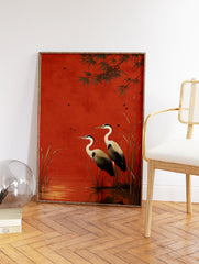 Two herons standing in water with reeds against a red background, with bamboo leaves and small birds flying. - Image 2