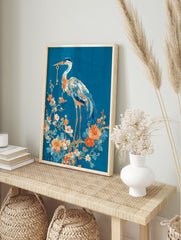 Elegant Heron with Key poster standing on a floral branch with orange and blue flowers against a deep blue background. - Image 4