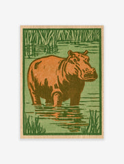 Illustrative hippo standing in water with green reeds, orange and green palette, block print style wall art print