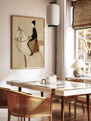 Illustrative sepia print of a horse and rider in profile, with fine linear textures and minimalist, in a styled room mockup