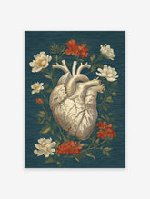Vintage anatomical human heart art print with white and red flowers and green leaves on a textured dark blue background.