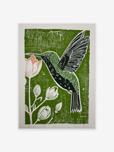 Green linocut print of a hummingbird drinking nectar from a pink flower, surrounded by botanical buds, on a textured background.