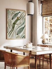Primitive style hunter with spear and two striped fish, surrounded by green leaves and abstract, in a styled room mockup