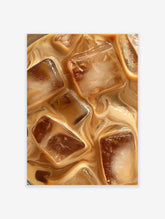 Close-up of iced coffee with ice cubes and cream swirling, a photographic iced coffee wall art print.