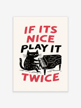 Illustration of a black cat playing a grand piano with the text If Its Nice Play It Twice in red and black typography