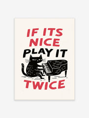 Illustration of a black cat playing a grand piano with the text If Its Nice Play It Twice in red and black typography