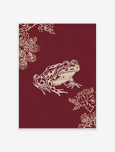 Illustrative frog print with beige amphibian and floral details on a deep red background, portrait orientation