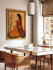 Illustrative Indian woman wall art in red and orange attire with floral botanical elements and gold, in a styled room mockup