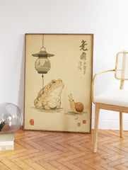Traditional Japanese animal wall art featuring a toad and a snail beneath a hanging lantern with calligraphy. - Image 2