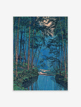 Japanese bamboo forest wall art with a blue river reflecting tall green trees and a small hut in the dense foliage.