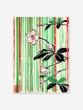 Japanese botanical poster with white flowers, black leaves, and red and green vertical stripes on a cream background, featuring a red stamp.