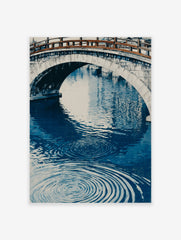 Japanese Bridge Poster with a stone arch bridge over blue water featuring prominent ripples, in an illustrative style.