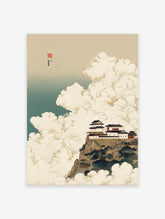 Traditional Japanese castle art print on a mountain cliff surrounded by white clouds and a blue-green sky.