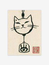 Black ink Japanese cat poster with bell-shaped face, kanji pendant, and red seal on cream background