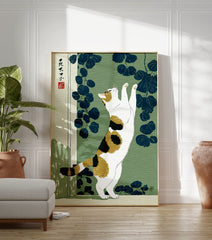 Japanese Ukiyo-e style print of a calico cat stretching against a green background with dark blue leaves. - Image 3