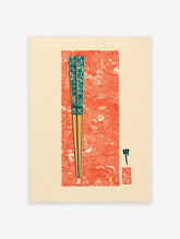 Japanese chopsticks wall art print with teal patterns on a vibrant red swirling background, featuring cultural symbols.