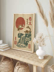 Japanese woodblock print of a crane and turtle by a waterfall under a red sun, with kanji text, in an alternate framed mockup
