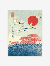 Japanese Crane Art print with three white cranes flying over red flowers and blue reeds against a red sun and dotted sky.