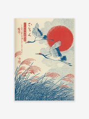 Japanese crane art print with two cranes flying over pampas grass and a red sun in a traditional Ukiyo-e style.