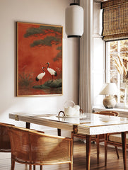 Japanese crane wall art print with two red-crowned cranes, pine trees, and water on a vibrant red background. - Image 3