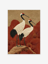 Japanese crane wall art with two red-crowned cranes on a rock, with red wave patterns and a textured beige sky
