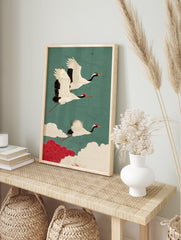 Traditional Japanese Crane Wall Art showing three white cranes with red heads flying in a teal sky with red and white clouds. - Image 3